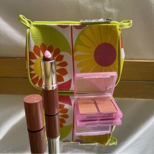 Clinique makeup sheer powder blusher dou. lipstick and small makeup bag.